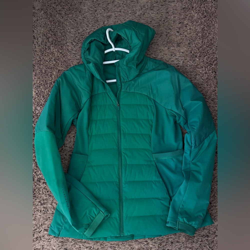 Lululemon Down for it all jacket. 
Women's Green Hooded Jacket